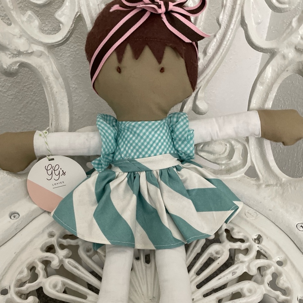 Doll with Teal and White Dress